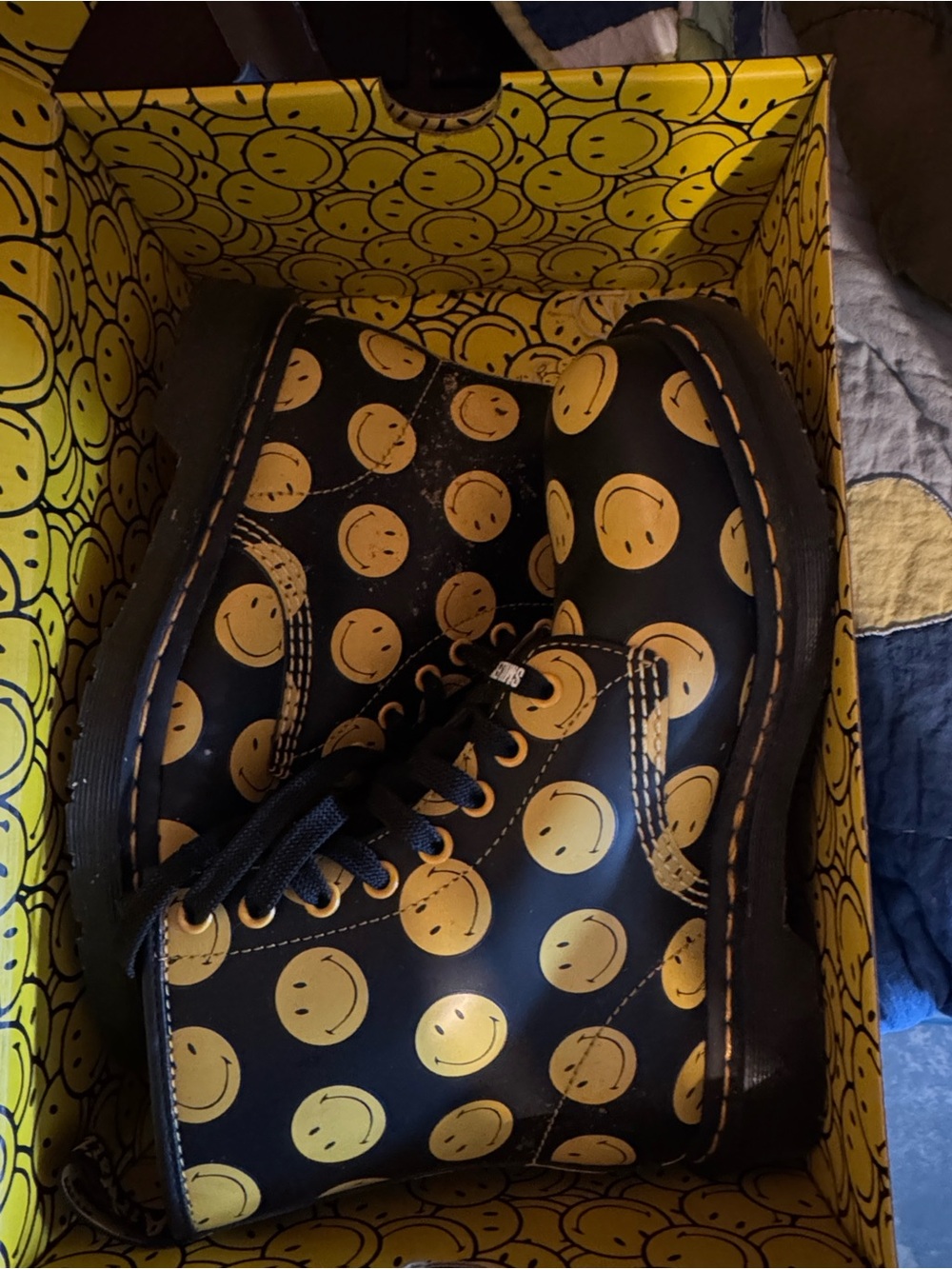 Dr. Martens Black Leather Combat Boots with Yellow Smiley Pattern